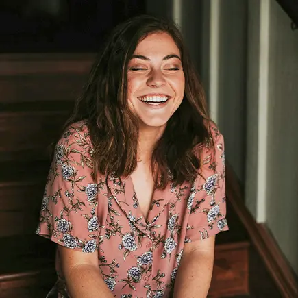 Woman Sitting on Stairs